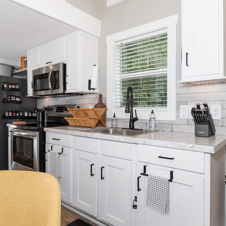 Interior view of kitchen of luxurious Coldwater Cottage at Ocoee River Mountain Cottages