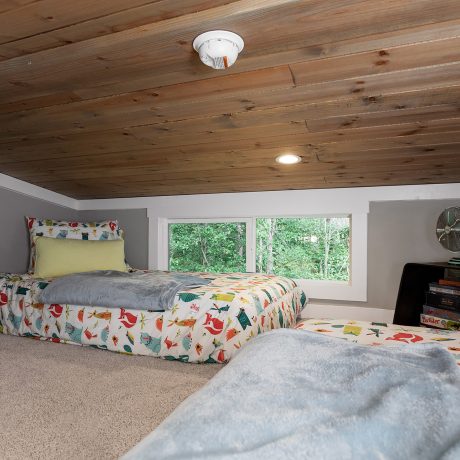 Interior view of the loft room of a luxurious Coldwater cabin at Ocoee River Mountain Cottages