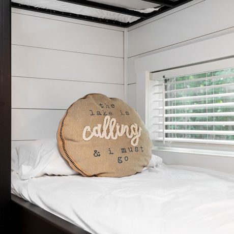 Interior view of the bedroom the of luxurious Swayback Cottage at Ocoee River Mountain