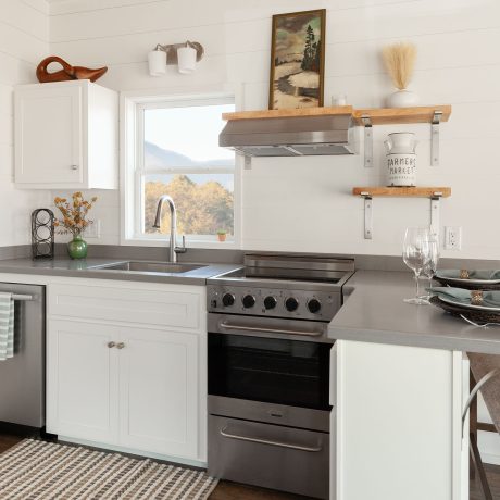 Interior view of kitchen room of luxurious Cumberland Cottage at Ocoee River Mountain Cottages