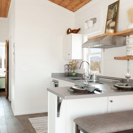 Interior view of kitchen room of luxurious Cumberland Cottage at Ocoee River Mountain Cottages