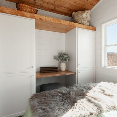 Interior view of bedroom of luxurious Cumberland Cottage at Ocoee River Mountain Cottages