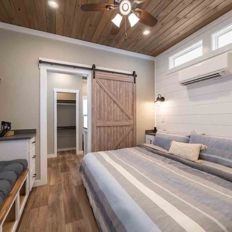 Interior view of the bedroom of a luxurious Cheaha cabin at Ocoee River Mountain Cottages