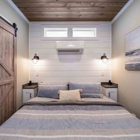 Interior view of bedroom of luxurious Cheaha Cottage at Ocoee River Mountain Cottages