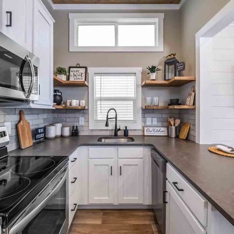 Interior view of kitchen of luxurious Cheaha Cottage at Ocoee River Mountain Cottages