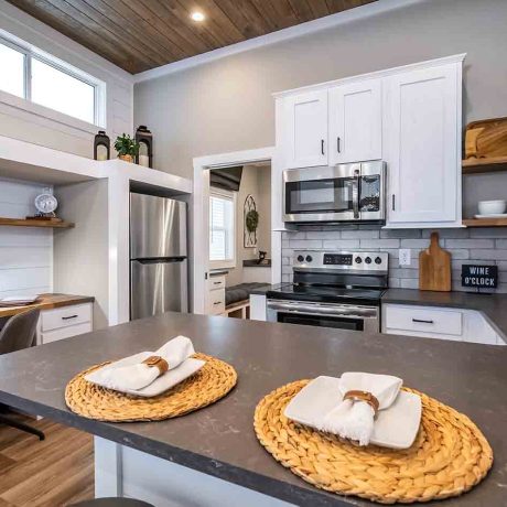 Interior view of the kitchen of a luxurious Cheaha cabin at Ocoee River Mountain Cottages